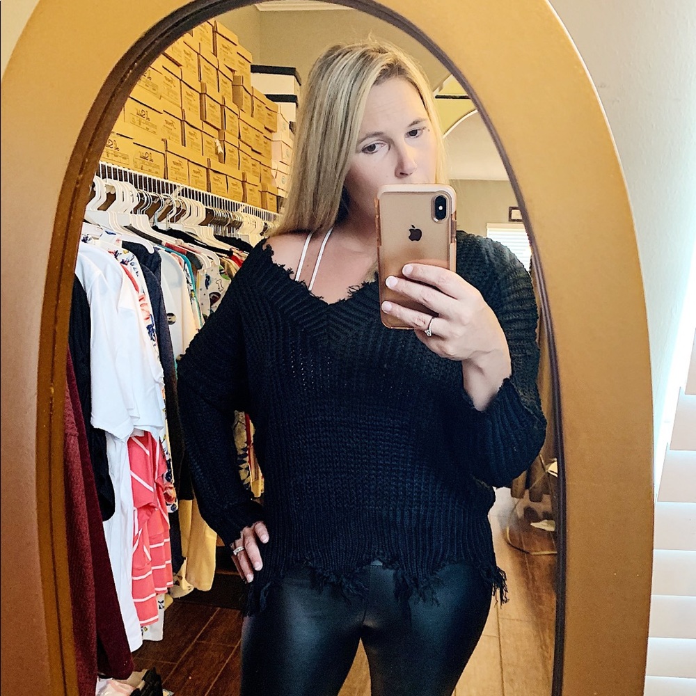 Black distressed sweater.